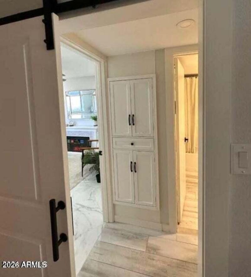 PRIMARY BEDROOM ON SUITE BARN DOOR