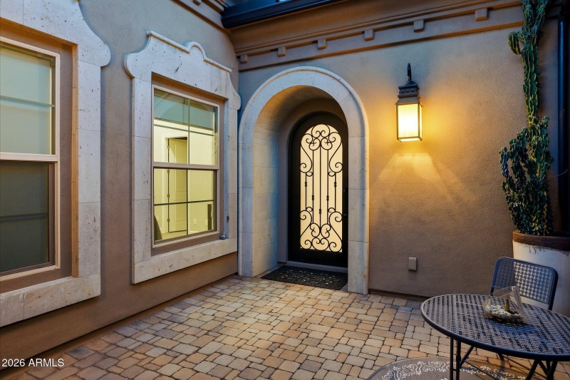 Entry w Custom Iron Door