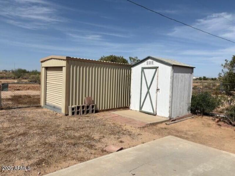 two sheds on property