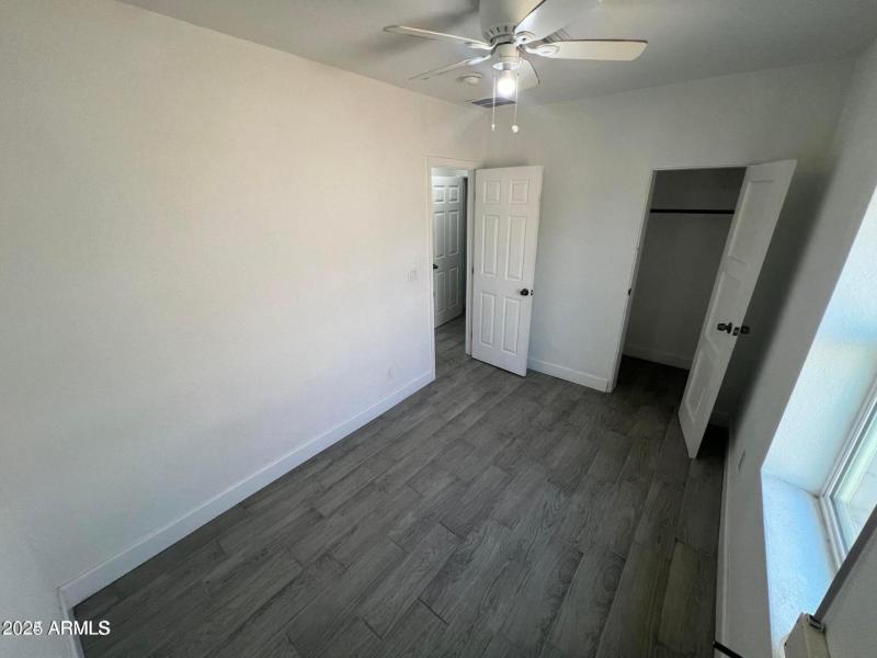 Bedroom With Dual Closets