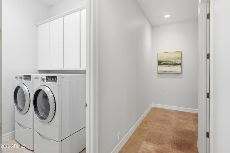 Laundry room with lots of cabinets