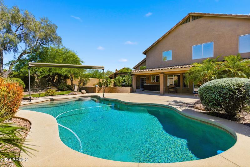 Spacious pool with table