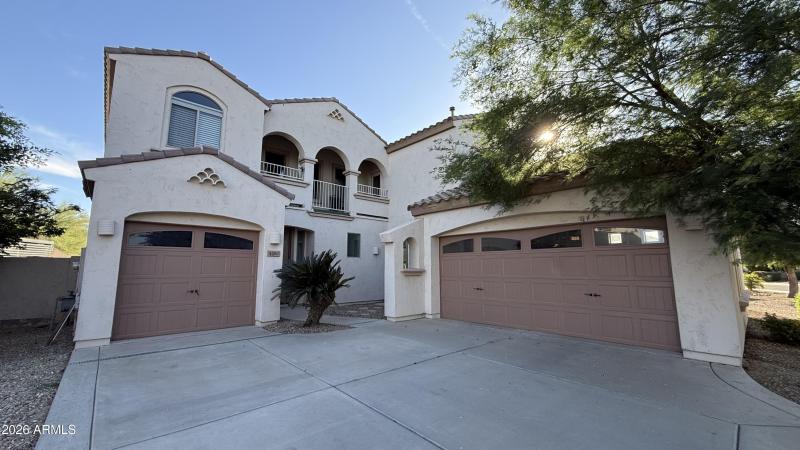 Twilight Exterior with 3-Car Garage