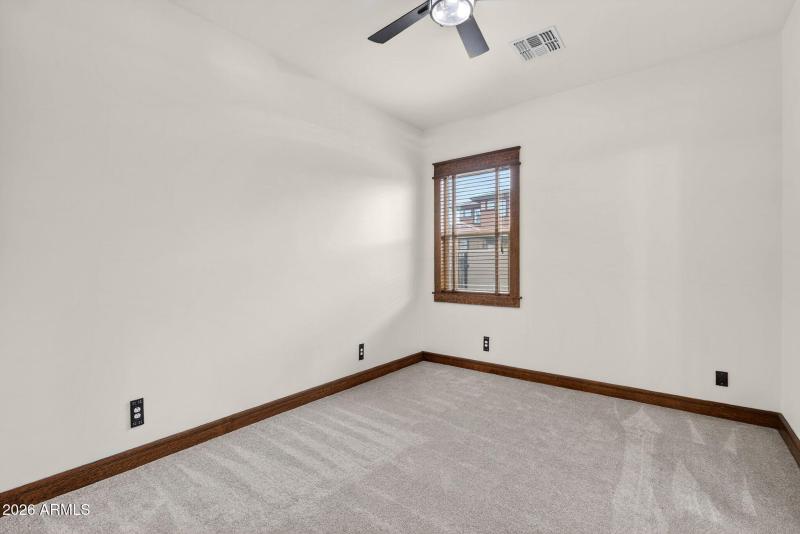 Spacious Bedroom with Ceiling Fan