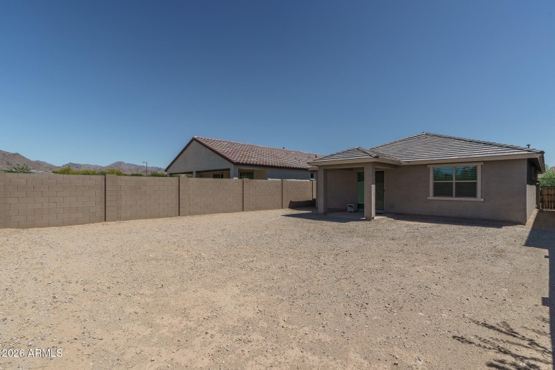 24) BACK OF HOME