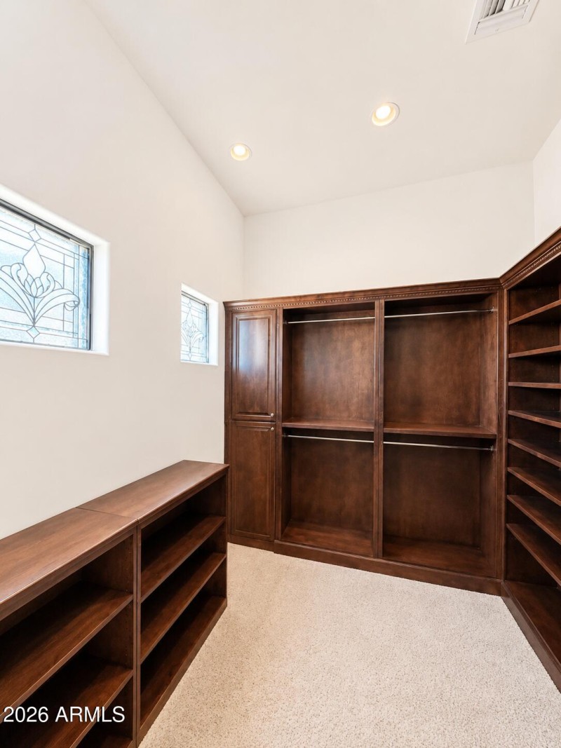 1st of 2 Primary Suite's Closets