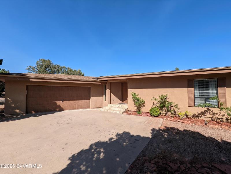 Front of House with attached Garage