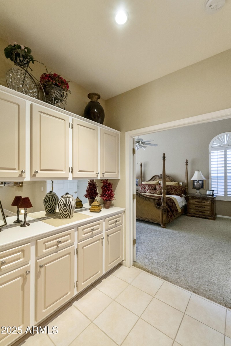 Cabinets outside primary suite entry