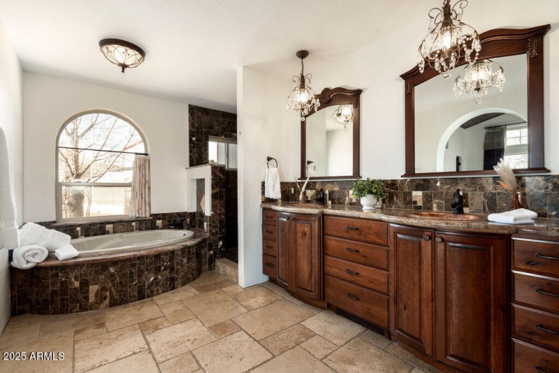 soaking tub and large shower