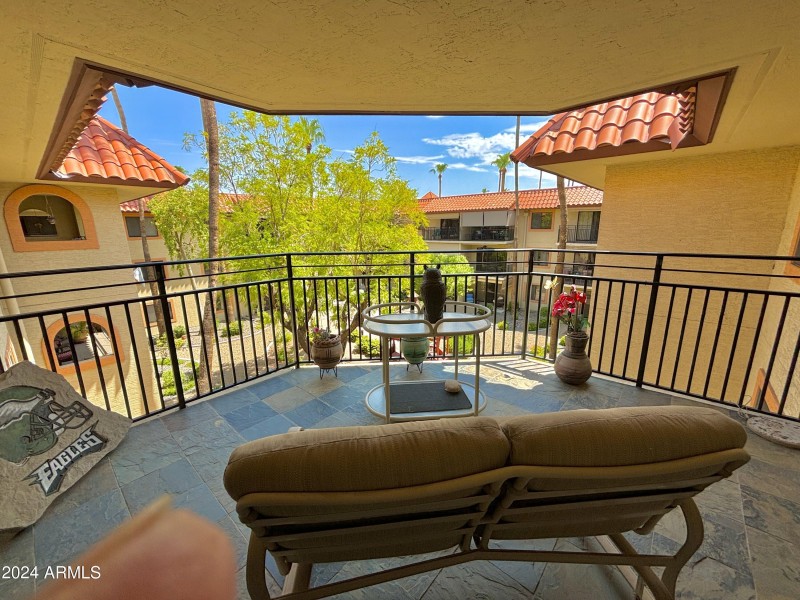 Corner tiled patio with view