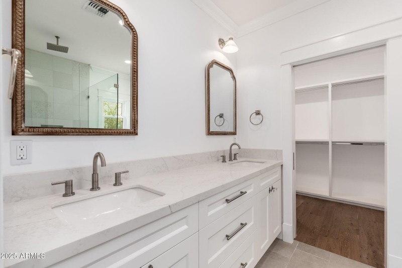 Primary Bath with Door to Walk-In Closet