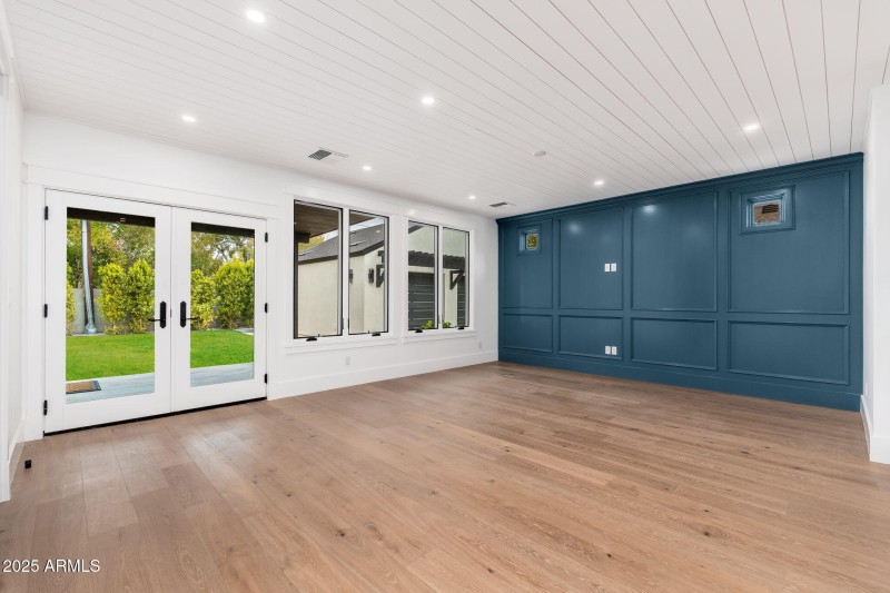 Great Room TV Wall & Windows to Backyard