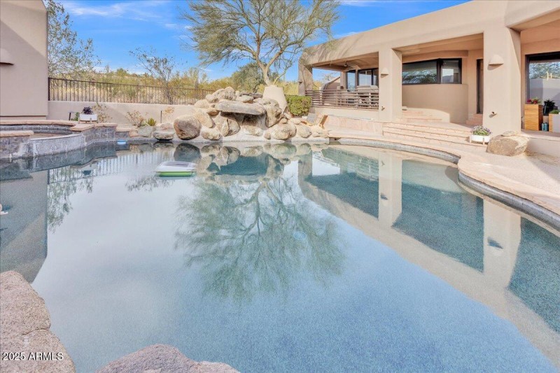 Pool, spa, and waterfall