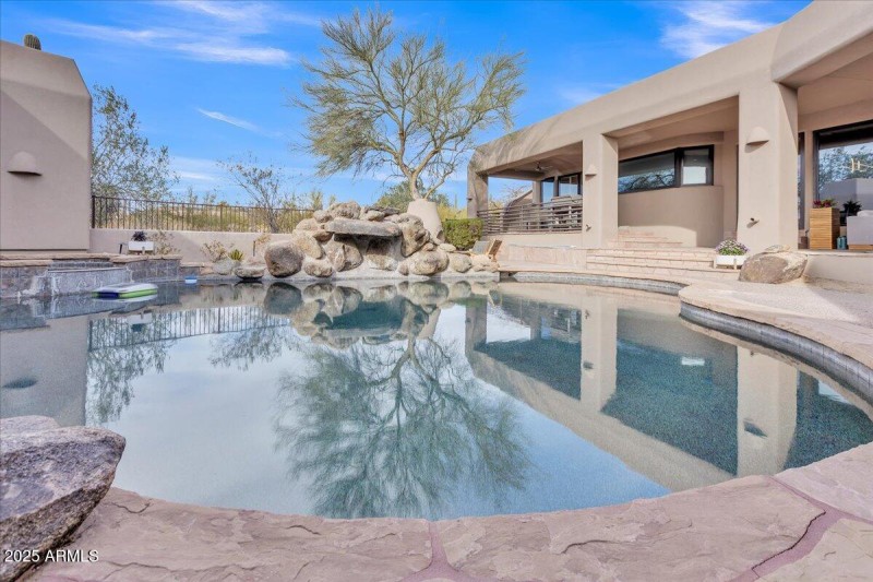 Pool, spa, and waterfall