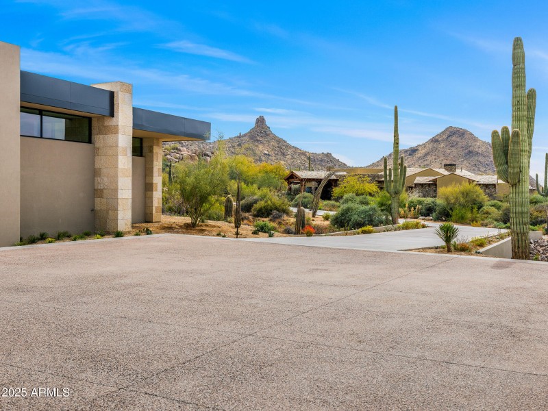 driveway entrance with mountain views