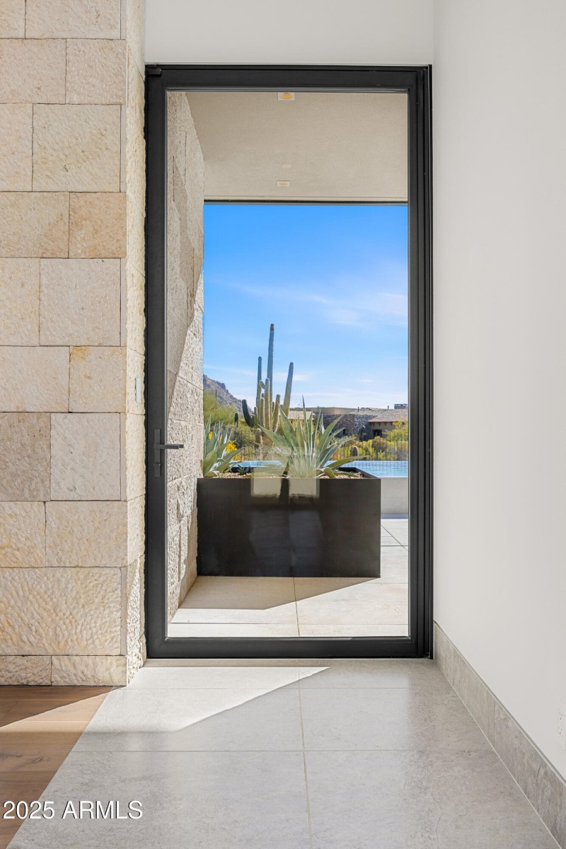 primary bedroom floor to ceiling window
