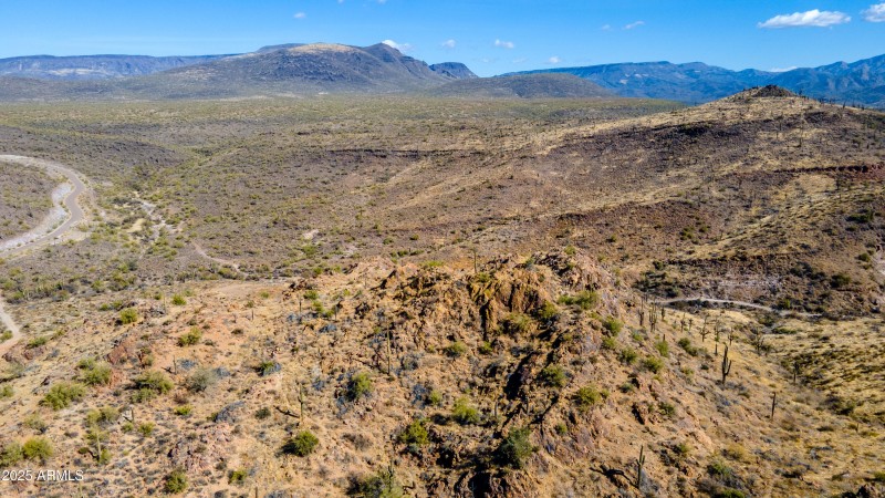 mountaintop crag above the property
