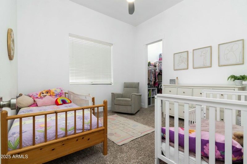 Guest bedroom with walk-in closet
