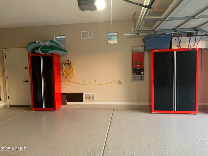 garage with tool cabinets