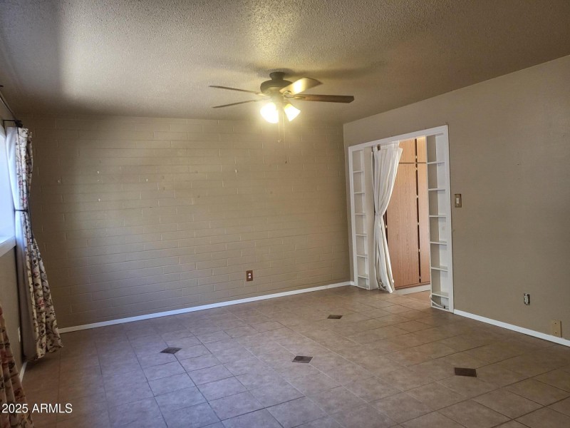 EXIT TO ENCLOSED PATIO