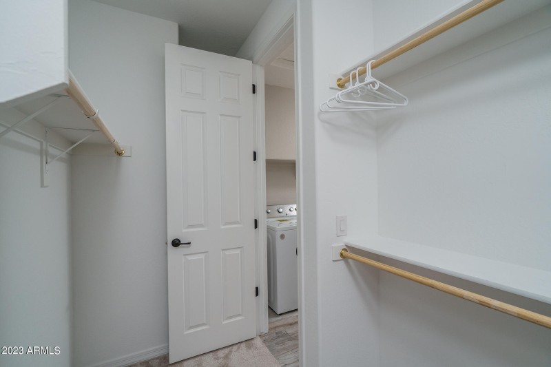 14) MASTER CLOSET TO LAUNDRY