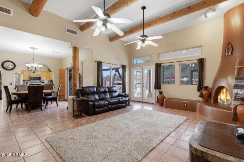 Living room with woodburning fireplace