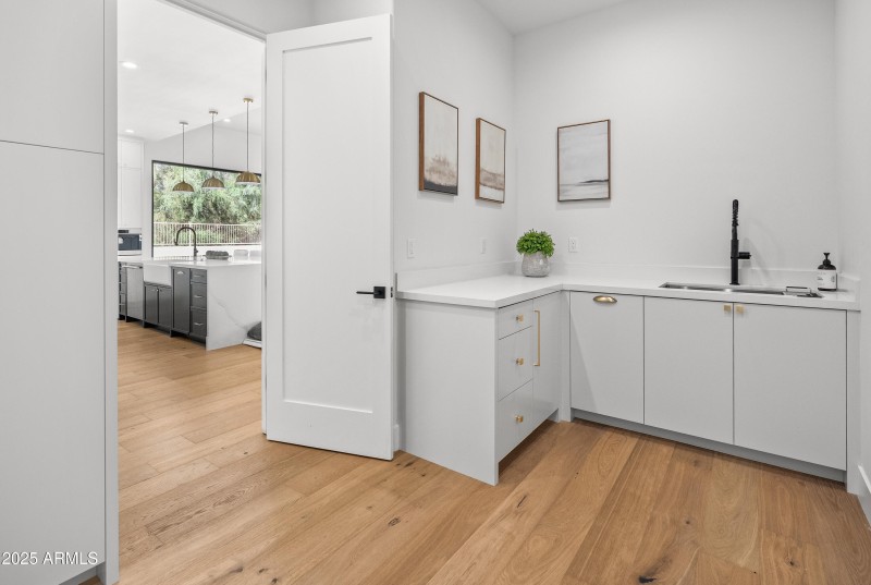 Laundry Storage & Tons of Folding space