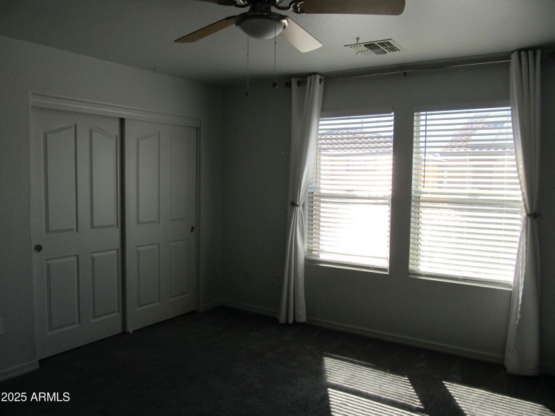 Primary bedroom (dual closets!)