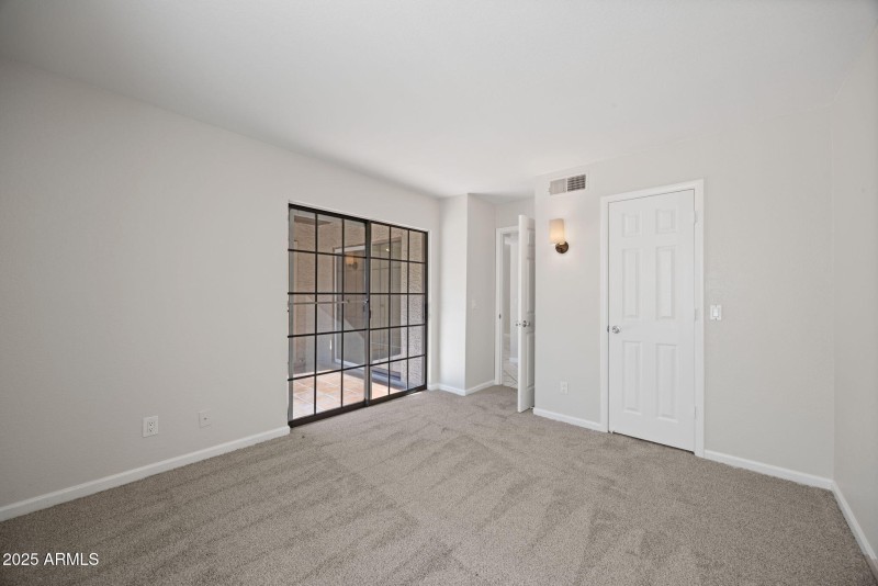 Bedroom View to Patio and Closet