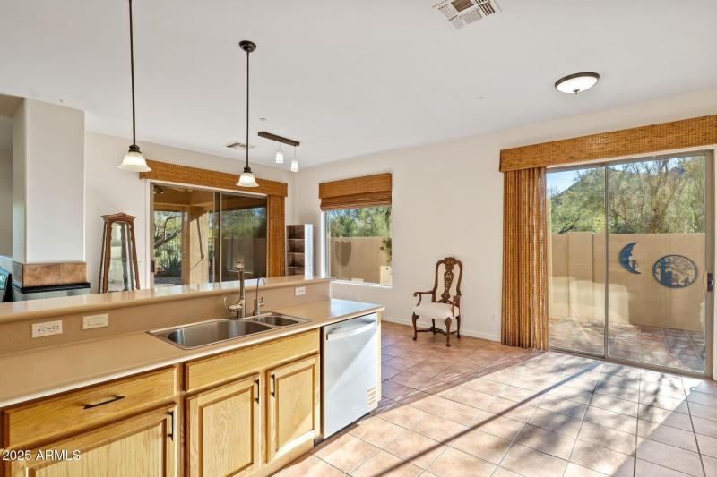 kitchen opens to bar b que area