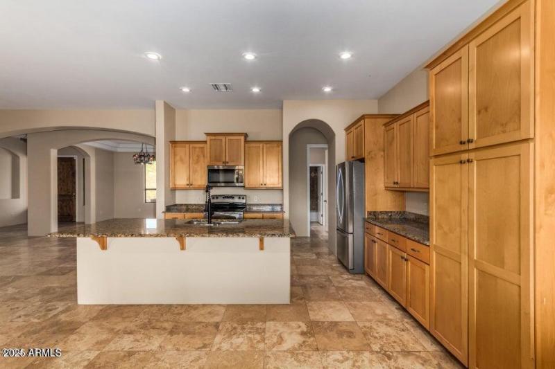 Kitchen photo with bar