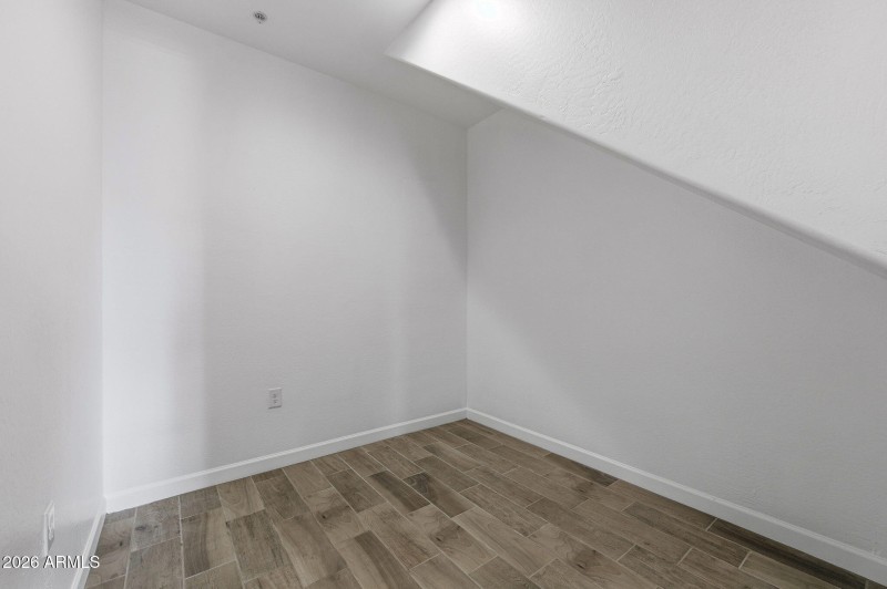 Storage room under stair on 1st floor