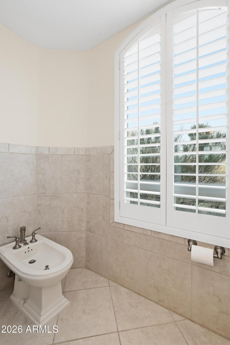 Private toilet room with bidet