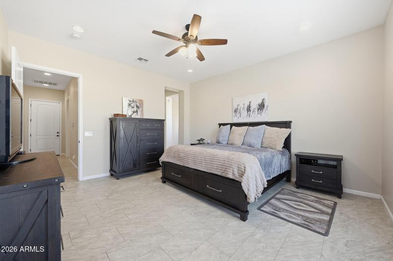 Master bed into large bathroom