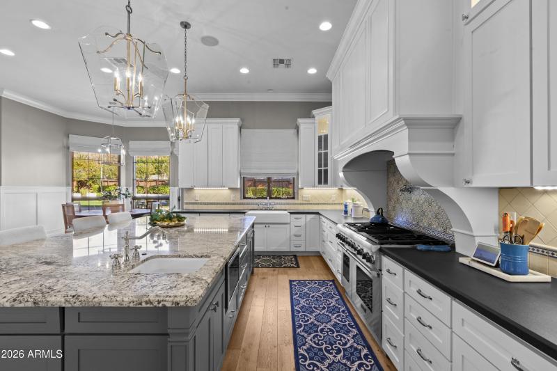 Lots of cabinets, stainless steel appl