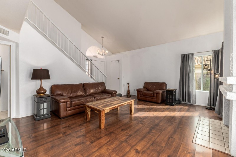 Living Room w/tons of light & Fireplace!
