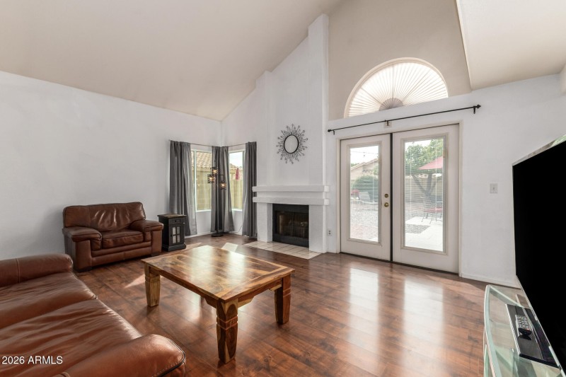 Living Room w/tons of light & Fireplace!