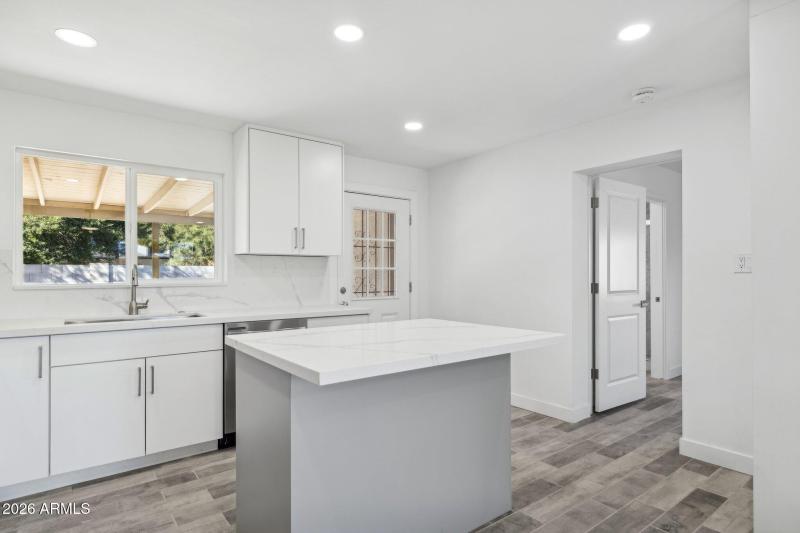 Bright Kitchen with Backyard View