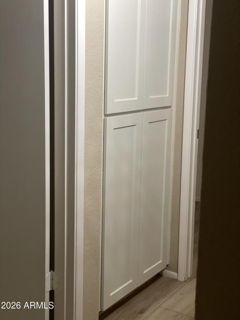 one of two linen closets