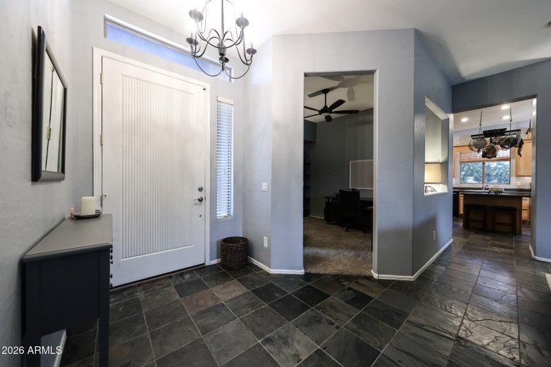 FRONT DOOR WITH DEN ADJACENT