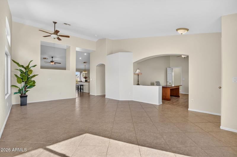 Living room and open office or den