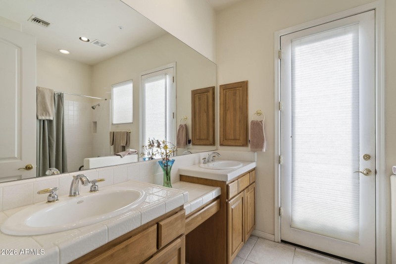 Hall bath with separate exit