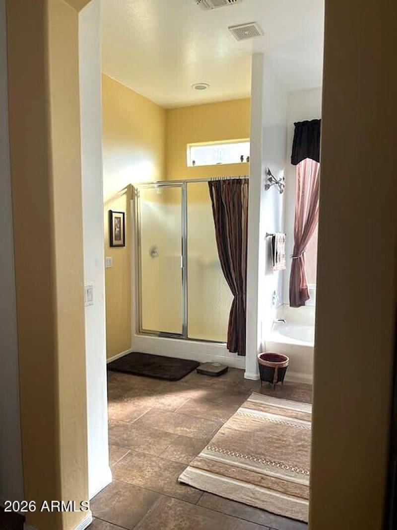 Main bathroom with a walk-in shower.