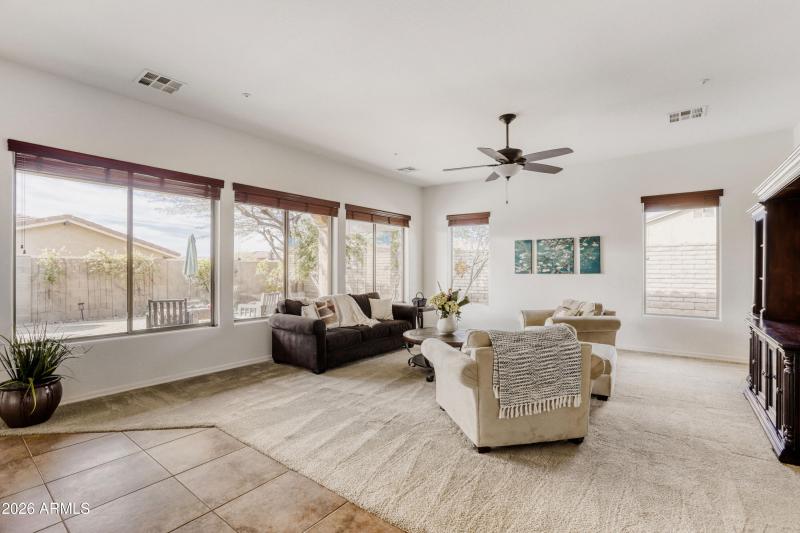 Picture windows of inviting backyard