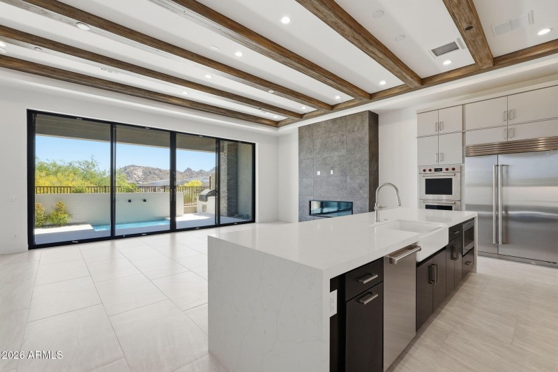 Kitchen & Great Room W Wall Fireplace