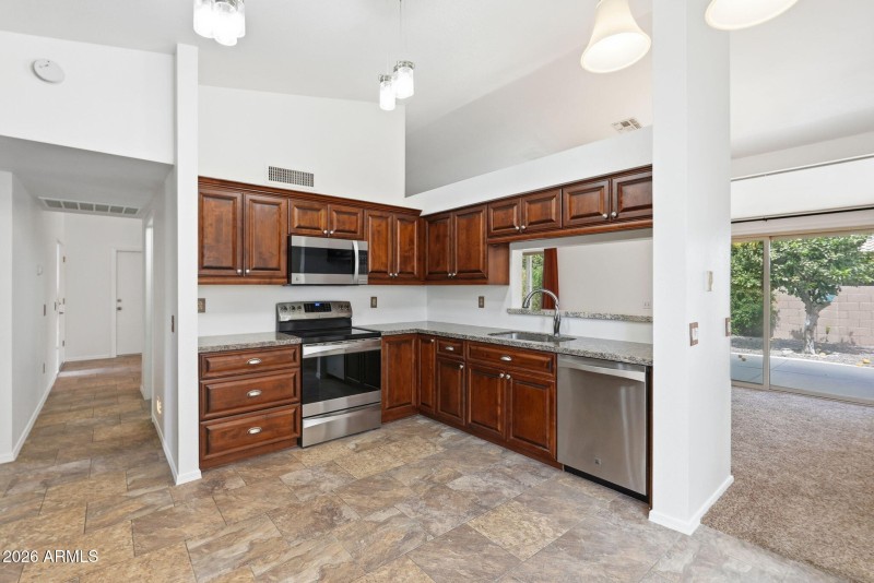 Kitchen to hallway and dining